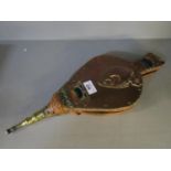 An Arts & Crafts enamelled copper, brass and leather fire bellows with embossed floral decoration,