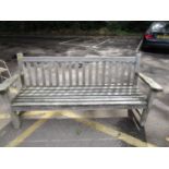 An oak slatted garden bench, 35" x 74" x 24"