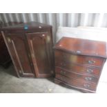 A Georgian oak wall hanging corner cupboard, together with a reproduction mahogany chest of four