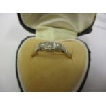 An Art Deco diamond three stone ring