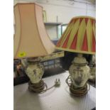 Two late 20th century ceramic lamps on wooden bases, together with two miscellaneous shades