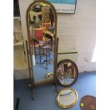A reproduction cheval swing mirror having gilt highlights, together with two wall mirrors