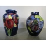 Two Moorcroft Pottery small vases, one of shouldered form decorated with two tube lined iris, 3 5/