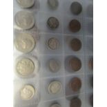 An album of mainly foreign coinage and British tokens to include two Chinese coins, American and