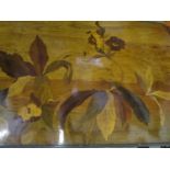 Emile Galle, Nancy - a marquetry low table, the top inlaid in various woods in a floral design,