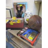 Collectables to include a vintage brown leather football, 1990s film merchandise and a Manchester