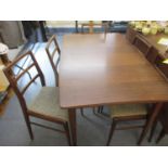 A retro Richard Hornby Aformosa teak table, together with five matching ladderback chairs