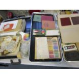 Two cases containing various artists equipment including pastels, Japanese ink blocks etc