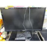 A Samsung 26" flat-screen HDTV television and remote control