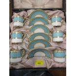 A Wedgwood Ulander patter coffee set of six coffee cans and saucers, in a light powder blue and gilt