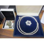 A cased cultured pearl necklace, together with Swarovski jewellery and a pocket watch chain