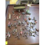 A collection of vintage lead Zulu War soldiers and warriors, model railway accessories and a