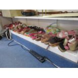 A large collection of brand new Polelo ladies flip flops and wedge shoes of various sizes,