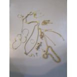A selection of mainly 9ct gold chain necklaces, ear studs, bracelets and other items