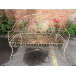 A metal wire constructed garden bench, 37 1/2"h x 44 1/2" x 19 1/2"