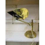 A vintage brass desk lamp