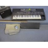 A Yamaha PSR 2700 electric keyboard, together with a Squire Champ amplifier