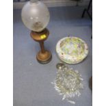 An early 20th century glass ceiling light, a Victorian oil lamp with funnel and shade and a bag