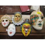 Five modern wall hanging theatre masks