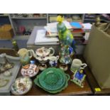 A mixed lot of ceramics to include an oriental pottery cockatoo, a Gaudy Welsh teapot, green leaf
