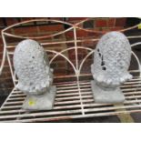A pair of white painted aggregate stone pineapple finials A/F, 17 1/2"h