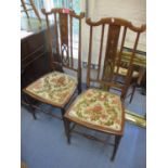 A pair of early 20th century Art Nouveau mahogany side chairs