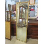 An early 20th century dressing mirror set in a moulded, gilt frame, 66" h, 20"w