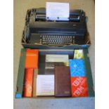 An IBM Selectric model 82 typewriter in mat black, golf ball type electric typewriter, date 28/2/