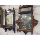 Two late Victorian mahogany wall mirrors with shelves below