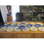 A set of twelve Spode limited edition Christmas plates, together with eight Bing and Grondahl blue