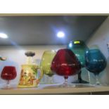 A selection of ornamental brandy balloon glasses, a Crown Devon Fieldings musical mug and a German