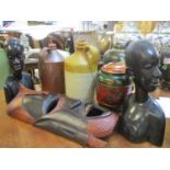 A mixed lot to include stoneware flagons, African busts, a model of a giraffe and other items