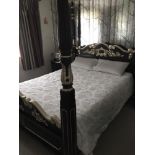 Two bed frames to include one having a black lacquered framed with ornate silver painted headboard