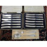 Two cased sets of silver handled butter knives and rat tail silver spoon and fork, London 1927/28,