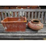 A terracotta garden planter, A/F and a painted pottery garden pot A/F