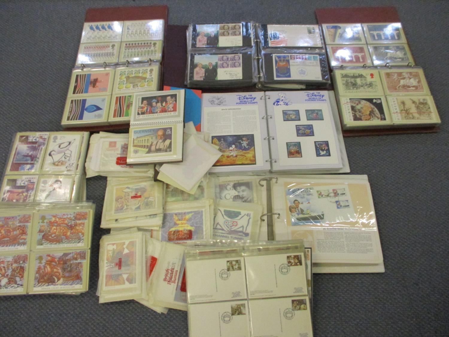 A quantity of First Day covers, a coin cover, mixed postcards and a 1982 Hula Hoops Sporting Medal - Image 2 of 2