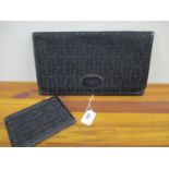 A late 20th century Louis Feraud black clutch bag and matching wallet