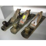 A group of three metal and wood Stanley Ballies No 6 woodworking planes to include one for un-sawn