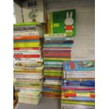 A collection of retro children's books to include Ladybird books, The Mr Men pamphlet books and