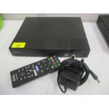 A Sony BluRay player model BDP-S370 with remote control, region free, will play regions 1-6