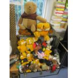 A large selection of soft toys together with a vintage trunk