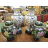 Four 20th century Chinese cloisonne vases on pierced stands