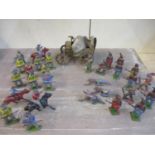 A collection of vintage lead figures of Cowboys and Indians, together with a covered wagon
