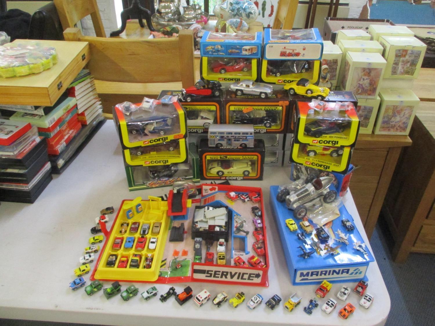 A mixed lot of toy cars to include Corgi, Matchbox and Micro Matches