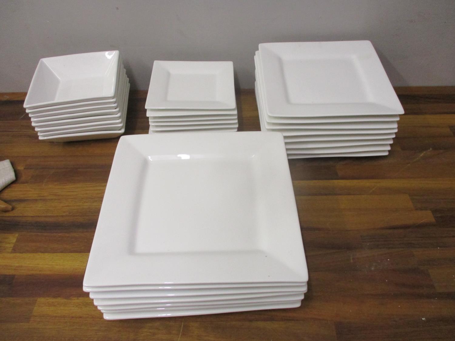 A Maxwell Williams white glazed dinner service, 31 pieces