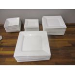 A Maxwell Williams white glazed dinner service, 31 pieces