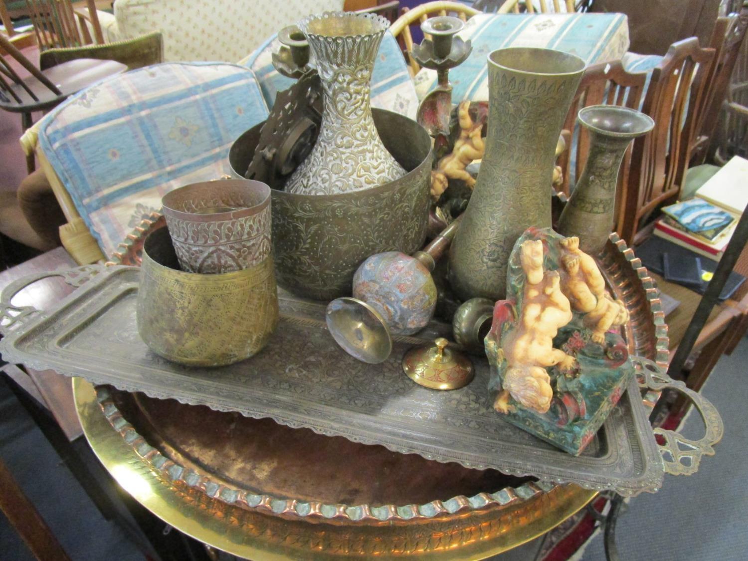 A quantity of mixed Indian brassware to include a rosewater sprinkler and a photograph frame