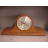 An early 20th century oak cased, 8 day mantle clock