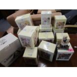 Approximately fifteen Leonardo painted box poppet figurines, designed by Christine Hawarth, boxed