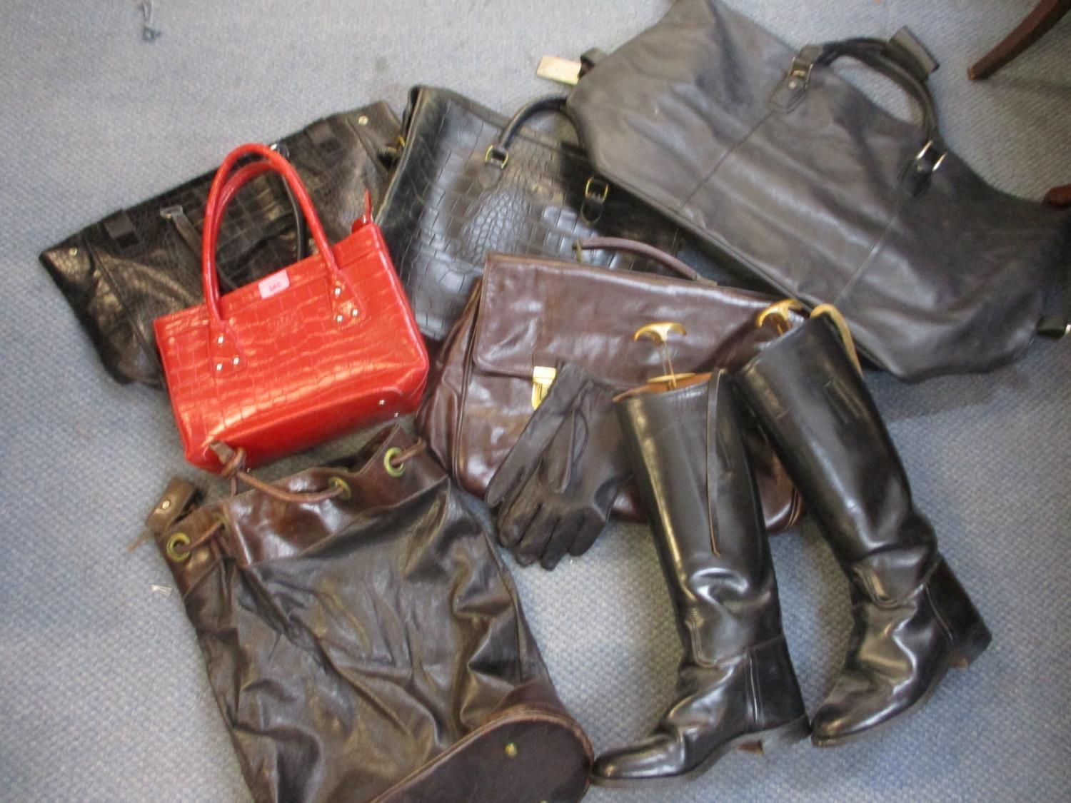 A red Osprey handbag, an Abro black shoulder bag with dustbag, a Levington and Moon black handbag, a